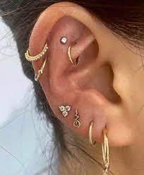 I Guess One Upside Of Having Small Ears Is That It Gets Crowded Pretty Quick Piercing Earings Piercings Cool Ear Piercings Pretty Ear Piercings