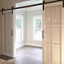 These doors are perfect for adding texture to any room. Susie On Instagram A Crisp Alternative To Barn Doors I M Liking This Look Glass Barn Doors House Design Home