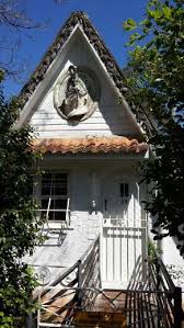 The Iconic Bardon Fairy House Is For Sale And Desperately Needs A Loving Owner To Orchestrate House Painting And Surface House Painting Fairy House Exterior