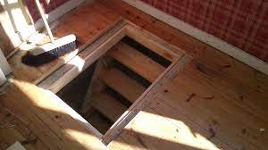 We found this basement entrance hidden under a carpeted trap door on photobucket. A Trap Door In The Cabin Floor Laplander S Natural Lore Blog