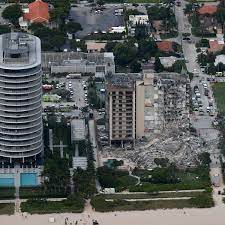 A crane with rescue workers surveys the collapse site in surfside, fla. Ewzsldx8zxqztm