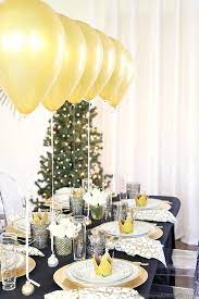 We're drooling over the apps & copper & matte black table! New Years Eve Table Decorations Festive New Year S Dinner Party Decor