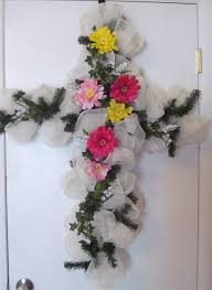 People are drawn to planting rose bushes at grave sites, particularly if the person was a gardener or loved a particular rose. This Is The Deco Mesh Cross That I Made I Am Going To Put This On My Mother S Grave For Easter Cemetery Decorations Cross Wreath Grave Decorations