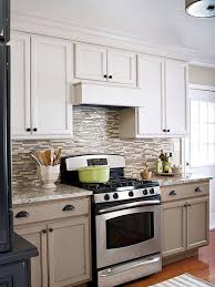 Take Painting Cabinets To The Next Level By Using Contrasting Colors Here A Creamy Taupe On The Low Taupe Kitchen Taupe Kitchen Cabinets New Kitchen Cabinets