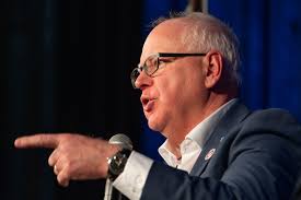 In Iowa, Tim Walz says Democrats demand leaders 'do something, dammit'