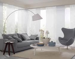 Wohnzimmer Flaechenvorhang Hellblau Vielfaltige Plissees Bezaubernde Flachenvorhange Liebevolle Vorhange Wohnzimmer Gardinen Wohnzimmer Innenarchitektur