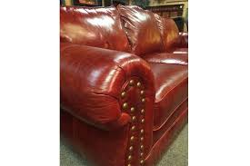 To make this sofa infinitely useable, it features wide track arms and a handy exterior pocket. Western Red Leather Sofa Upscale Distressed Leather Couch High End Hat Creek Interiors