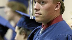Graduates in tornado-raked Okla. town vow to stay