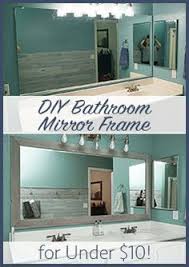 Diy Bathroom Mirror Frame Cheap Easy Do It Yourself Mirror Makeover Blue Wood Stain Whi Bathroom Mirrors Diy Diy Bathroom Bathroom Mirror Frame