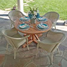 It can also be used as outdoor furniture. Lloyd Flanders All Seasons Wicker Dining Set With Teak Table Lf Allseasons Set1