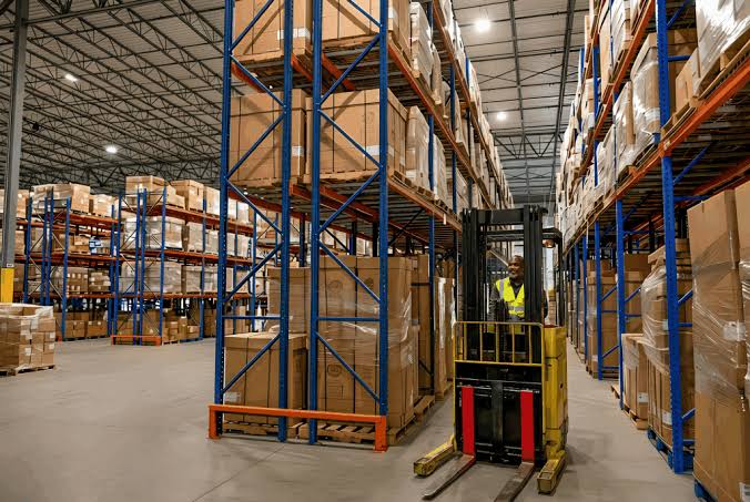 High clearance warehouse racking with a forklift operating in an Atlanta facility., AI generated