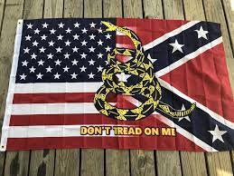 One half of flag painted traditional colors, other half painted with the gadsden flag and a torched line right down. Triple Threat Flag
