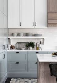 Soft Blue Gray Kitchen Cabinets Are So Stunning And Love The Mix Of Painted Cabinets With Wood Blue Gray Kitchen Cabinets Grey Kitchen Cabinets Kitchen Design