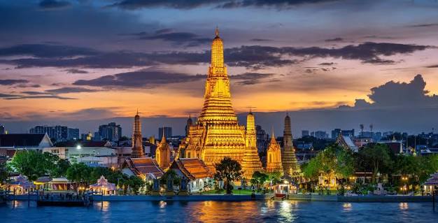 Bangkok, Thailand -- Grand Palace temples, golden spires and city skyline