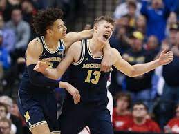 Watch Michigan Wins Then John Beilein Sprays Team With Super Soaker Michigan Wolverines Basketball Michigan Teams