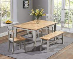 This dining table with two benches is designed to make all your meal times more pleasant and comfortable. Mark Harris Chichester Oak And Grey Large Dining Table With 2 Chairs And 2 Benches Cfs Furniture Uk