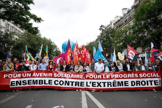Thousands march in France in pre-election protest against far right | Reuters