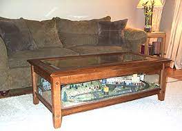 Hammary baja round coffee table. Train Table 3