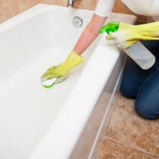 To stop stubborn water spots and mildew from forming, dry the tub with a rub the paste on a sponge or brush to clean. The Right Way To Clean And Scrub Your Bathtub Denver House Cleaning Services House Cleaners Dashing Maids