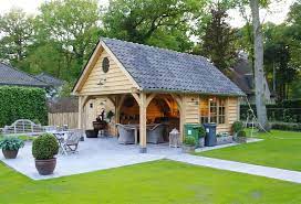 The bold flooring pattern is offest by the paler colour, making it the perfect balance in this small but punchy. Image Result For Outdoor Kitchens Uk Outdoor Kitchen Design Outdoor Patio Designs Outdoor Kitchen