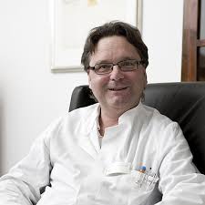 The act of taking off the back lid of a standard toilet, hovering your anus over the adding red food dye to the tank is called bud, or bloody upper decker. Clinic Dr Decker Hospital Management