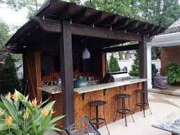 Entitled belly up to the outdoor bar this forested outdoor kitchen area features a sit down bar counter and pizza oven. 43 Classy Outdoor Bar Ideas You Ll Love Outdoor Patio Bar Gazebo Bar Diy Outdoor Bar