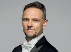 GLOWING BRASS IN THE CITY