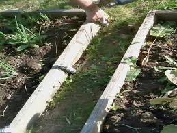 Unfold plastic or row cloth and lift to cover bed over hoops. Diy Hoop House Mike S Backyard Nursery