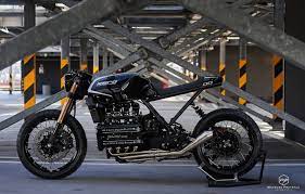 We publish regular features on custom motorcycle builds, riding gear reviews, how to guides and event coverage from around the globe. Bmw K100 Rs Zero 1990 Cafe Racer Custom By Dixer Parts Dixer Parts