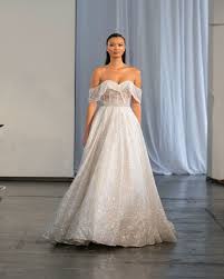 Berta Fall 2019 A Line Wedding Dress With Off The Shoulder Neckline Ruffle Detail And Sparkly S Sparkle Wedding Dress Glitter Wedding Dress Wedding Dresses