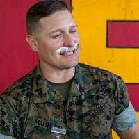 U.S. Marine Corps Sgt. Diego Zarate, protocol chief,