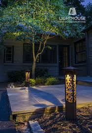 Nightscaping Grove Path Lights Decorate An Entryway To A Home And Cast Dramatic Shadow Patterns O Landscape Lighting Design Outdoor Lighting Landscape Lighting