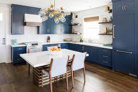 On the other hand, kitchen tables can afford homeowners more flexibility than islands when it comes to floorspace, design and functionality. Blue Kitchen With Dining Table Instead Of Island Transitional Kitchen