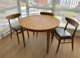 Extending dining tables come in different styles. Mid Century Modern Teak Dining Table And 4 Chairs Classifieds For Jobs Rentals Cars Furniture And Free Stuff