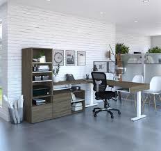 Desk is quite heavy and will require 2 people to lift. Viva 72w L Shaped Standing Desk With Dual Monitor Arm And Storage Bestar