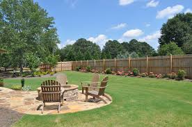 Timbertech has what you need to go big & stay home. Large Backyard Featuring A Fire Pit Camellia Model Marseille Via Edward Andrews Homes Large Backyard Landscaping Backyard Large Backyard