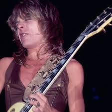 Randy Rhoads' soundchecks his guitar