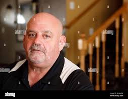 This Feb. 26, 2011 photo shows Layton Mayor Steve Curtis at his home in  Layton, Utah. Curtis, the second term mayor of Layton, died. He was 58.  After having Thanksgiving with his