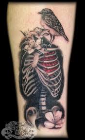Celebrities and pop stars are quite. 20 Skeleton Rib Cage Tattoo Designs