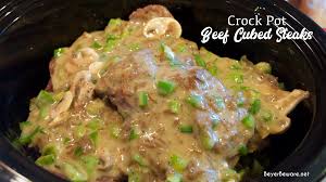 This tender steak is cooked in a sauce made with condensed cream of mushroom soup and brown gravy mix. Crock Pot Beef Cubed Steaks With Gravy Beyer Beware