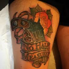 Cute side thigh tattoos for women with flowers and roses and small thigh tattoos for men. Best Gun Tattoo Meaning And Ideas Chhory