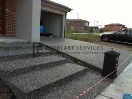 Other than the expansion joints which allow the material to expand and contract with minimal cracking, exposed aggregate is laid as a slab. Exposed Aggregate Concrete Melbourne Driveway Colours Cost
