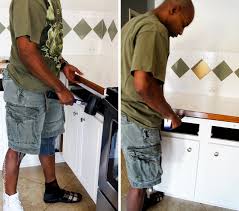 If you lay the tiles up to the cabinets and in future want to replace the cabinets, all you have to do is cut along the grout lines of the partial tiles and smash them out. Kitchen Removing Base Cabinet Countertops Backsplash