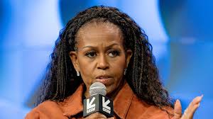 Michelle Obama challenges daughter Malia's decision to drop family name as she and sister Sasha 'push away' | HELLO!