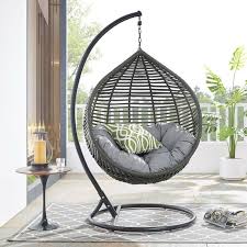 This luxury outdoor wicker hanging chair with stand and cushion by island gale is the perfect hanging chair for your backyard, porch or even inside a large indoor living room. Pin On R E