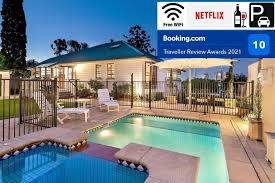 It features white edges with a blue pattern, while the patio is lined with black railing and white plinths. Ultimate Family Retreat 3 Bedroom Home Private Pool Amazing City Views Brisbane Wifi Parking Brisbane Updated 2021 Prices