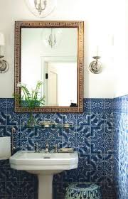 Decorative Blue Wall Tile Antique Mirror And Pretty Wall Sconces Tile Bathroom Beautiful Bathrooms Bathroom Inspiration