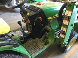 Remove grab handles from tractor fenders. 1999 John Deere 4100 Grossenburg Implement