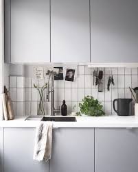 A modern kitchen island in chrome or painted in a deeper or contrasting colour to the wall cabinets will make it a focal point in a grey kitchen. My Ikea Kitchen Makeover The Transformation Cate St Hill