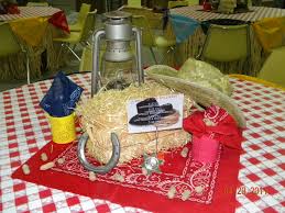 Western Party Theme Decorations The Tables Were Covered In Gingham Tablecloths Skirted With Rafia Skirting Western Theme Party Western Parties Cowgirl Party